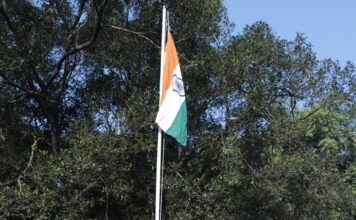 Union Minister Dharmendra Pradhan hoists the tricolor at his residence in New Delhi