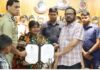 Revenue Minister-DG Fire Services handed over financial assistance of Rs. 1 crore to the family of late Chandan Patnaik, a firefighter who died while in relief and rescue operations during floods in Kendrapada