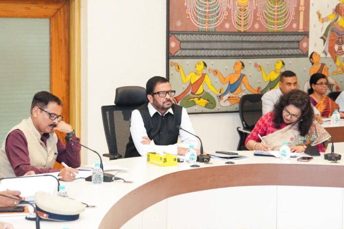 Revenue Minister Suresh Pujari,